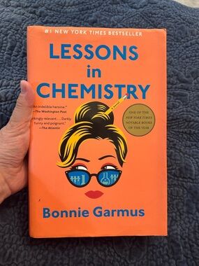 Lessons in Chemistry by Bonnie Garmus - Bright Orange Hardcover
